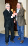 Julian Richards (of Meet the Ancestors) presents Time Team's Phil Harding with the prestigious 'Archaeologist of the Year' award at the Current Archaeology Awards