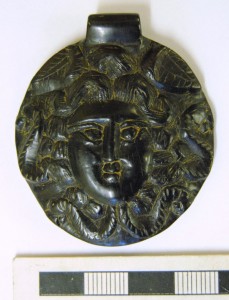 Jet Medusa amulet from the site. Image: Colchester Archaeological Trust